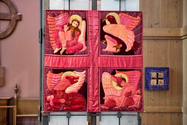 The banner hung on the reredos